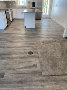 Flooring with electrical outlet